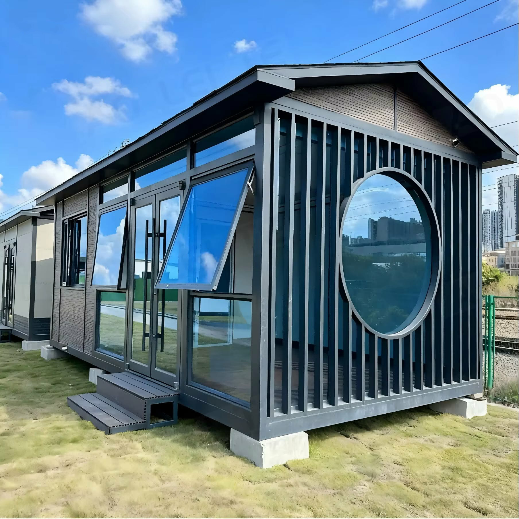 Blacksmith Small House — compact modern modular home at dusk